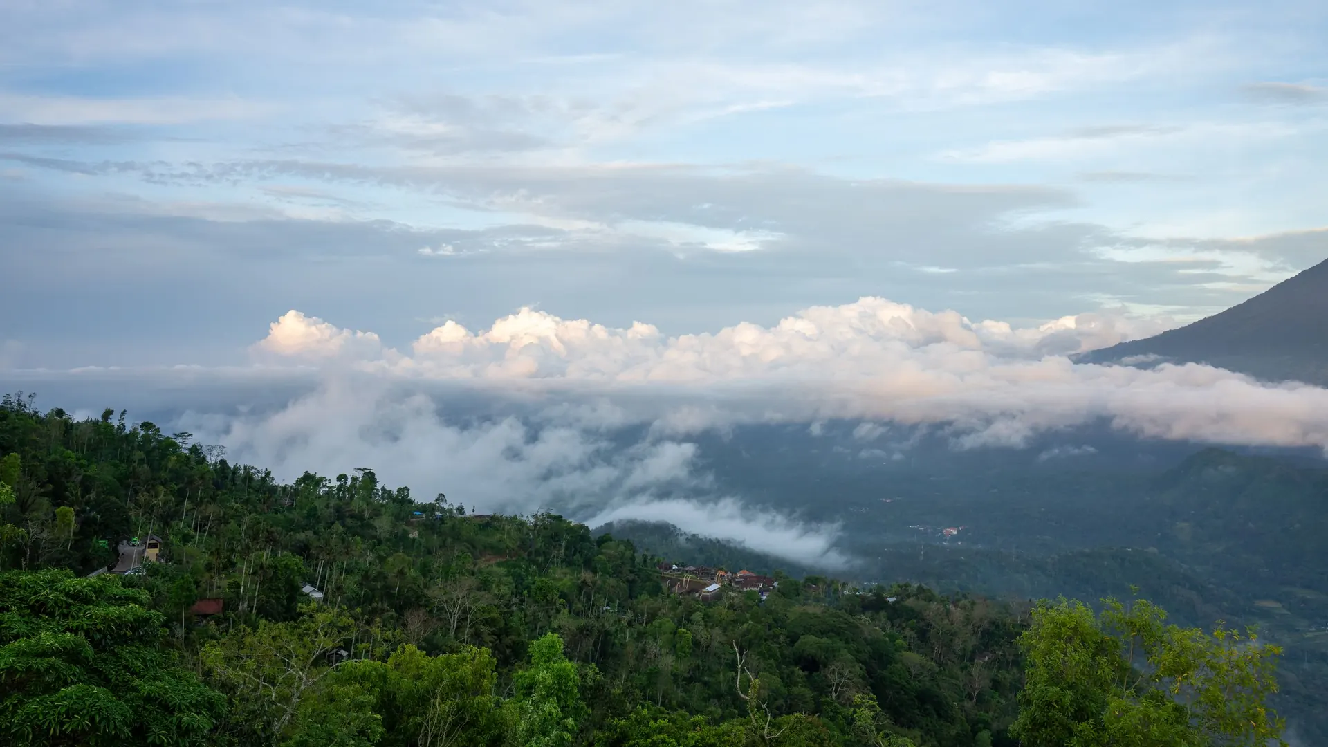 Clouds drifting over forested hills in the Bali highlands